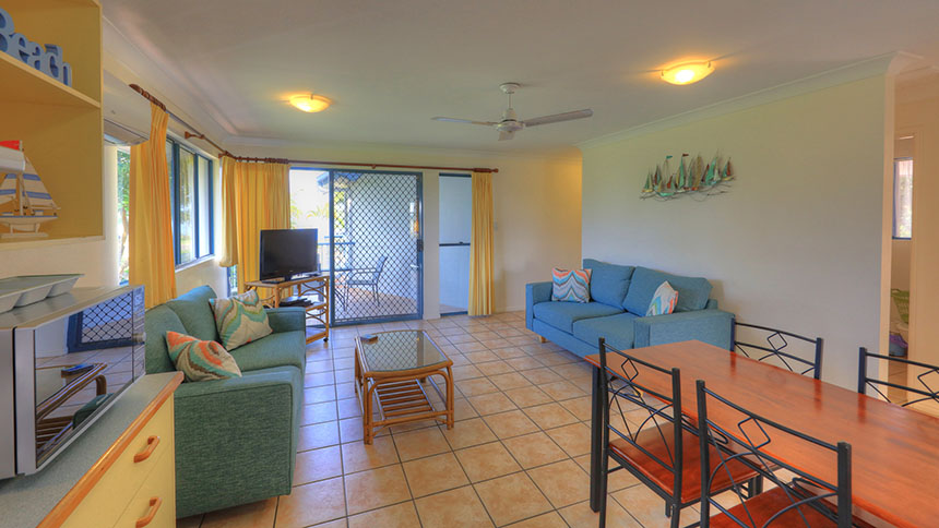 Dining and living area in a seaview apartment